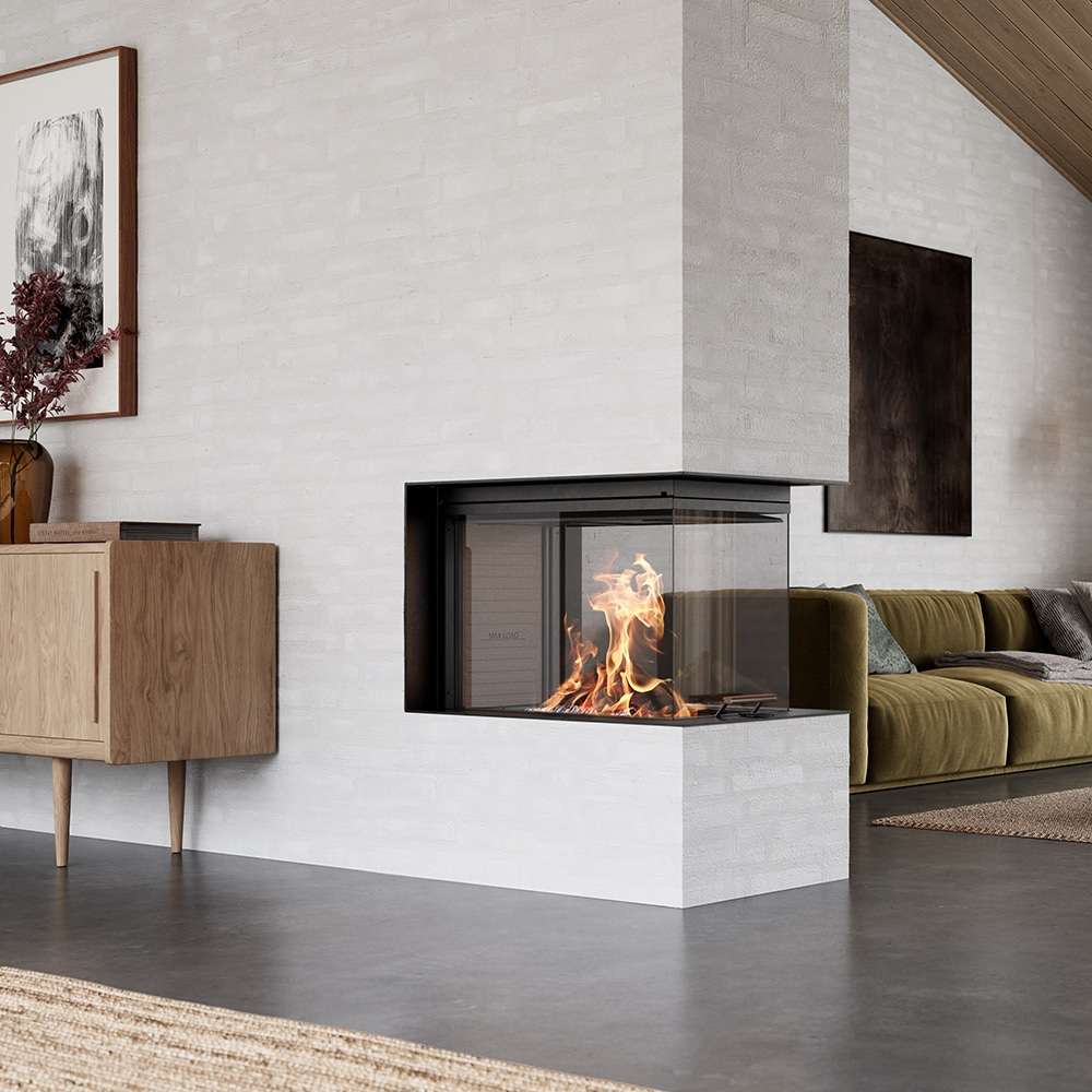 Rais Visio wood burning stove installed in a dividing wall