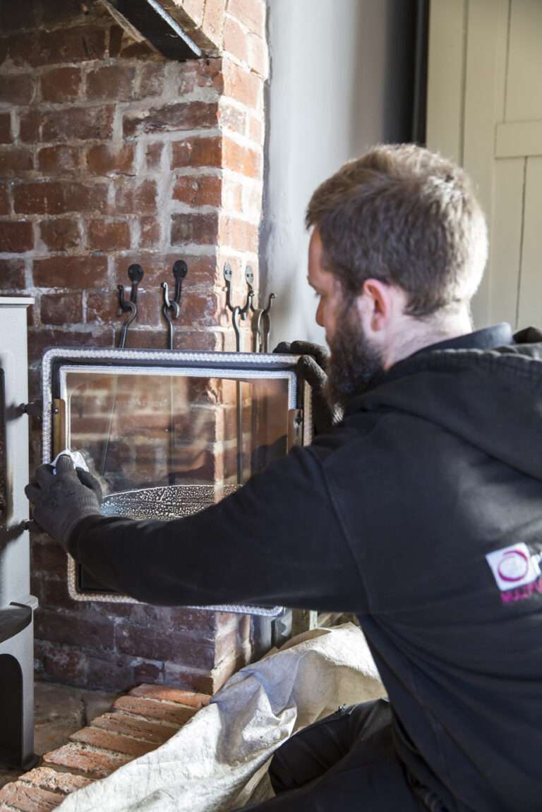 Man Servicing a Chimney